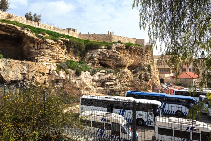 Golgotha was, according to the Gospels, a site immediately outside of Jerusalem's walls where Jesus was crucified. Golgotha is the Greek transcription in the New Testament of an Aramaic term. The Bible translates the term to mean "place of the skull." A modern-day bus terminal is located next to the hill many believe to be the site of "Golgotha."